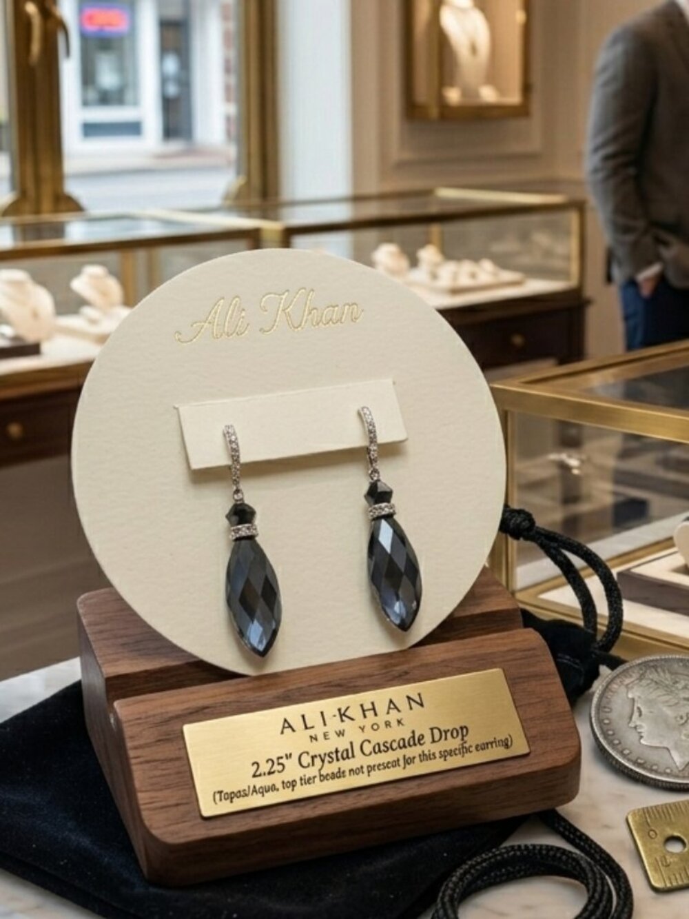 Ali Khan dangle/Drop earrings with a marquise-shaped faceted teardrop bead.